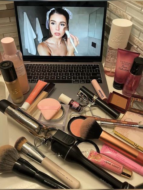Beauty blogger holding her favorite everyday makeup essentials